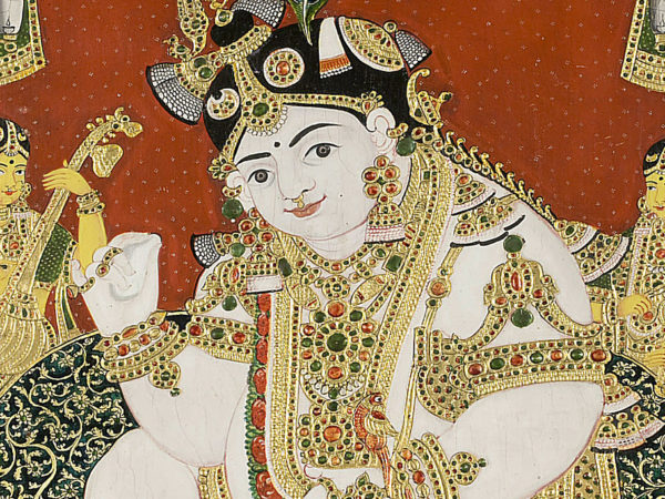 Detail of a painting of a elaborated costumed figure.