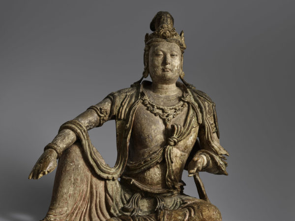 Image of wooden statue depicting Guanyin.